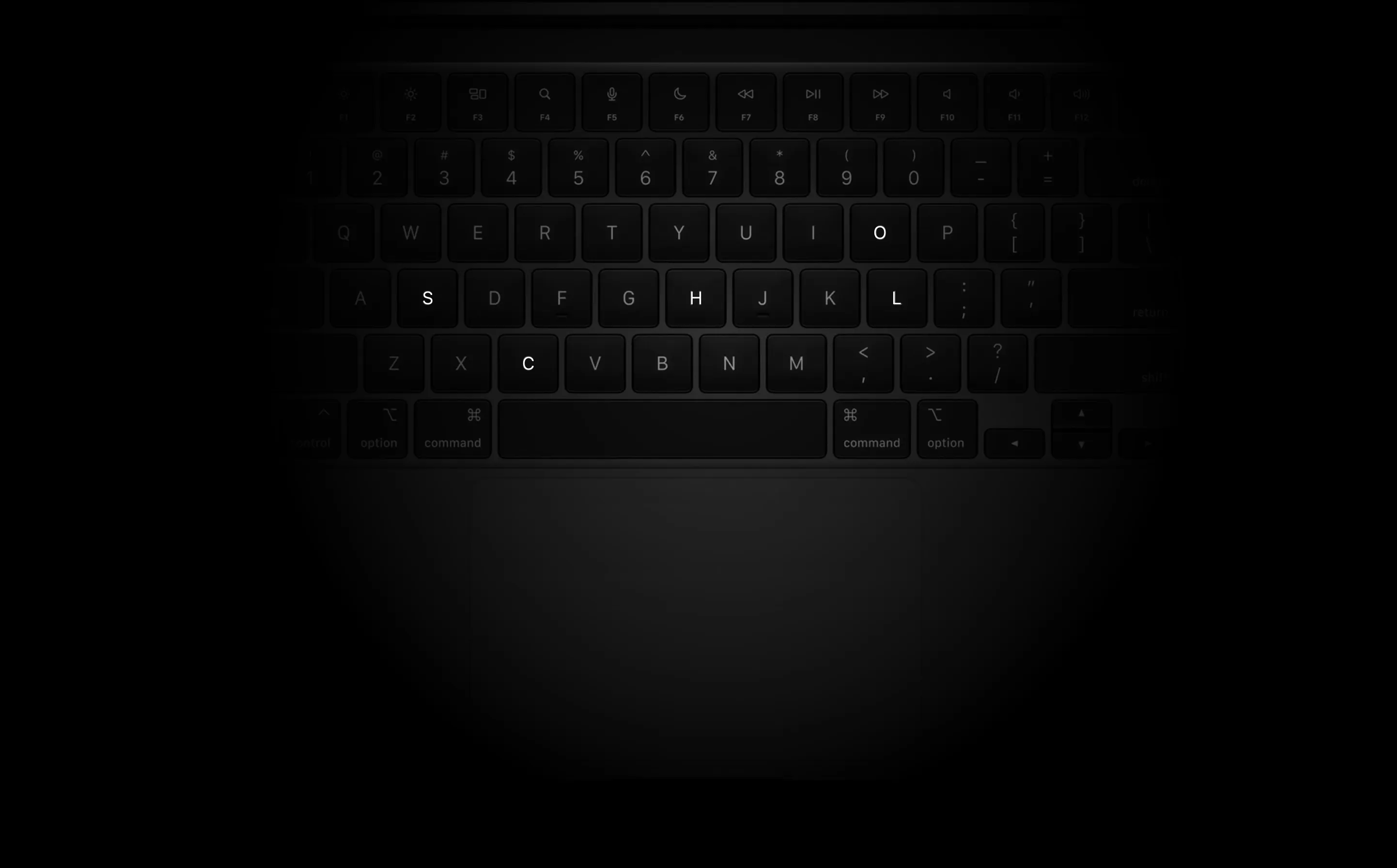 Mac keyboard displaying the letters for 'School' highlighthed